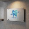 Brushed metal signage for a dental practice