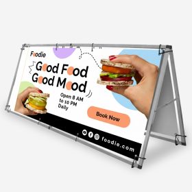Metal A-frame banner stand with food photographs and a fast food promotion.