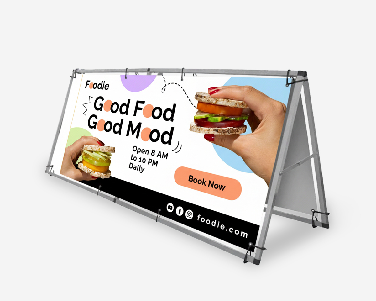 Metal A-frame banner stand with food photographs and a fast food promotion.