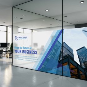 Blue and white business graphics applied to office glass partitions.