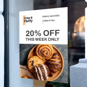 Bakery window cling with pastry photographs and “20% OFF” text.