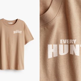 Tan printed T-shirt beside a close-up of its fabric and lettering.