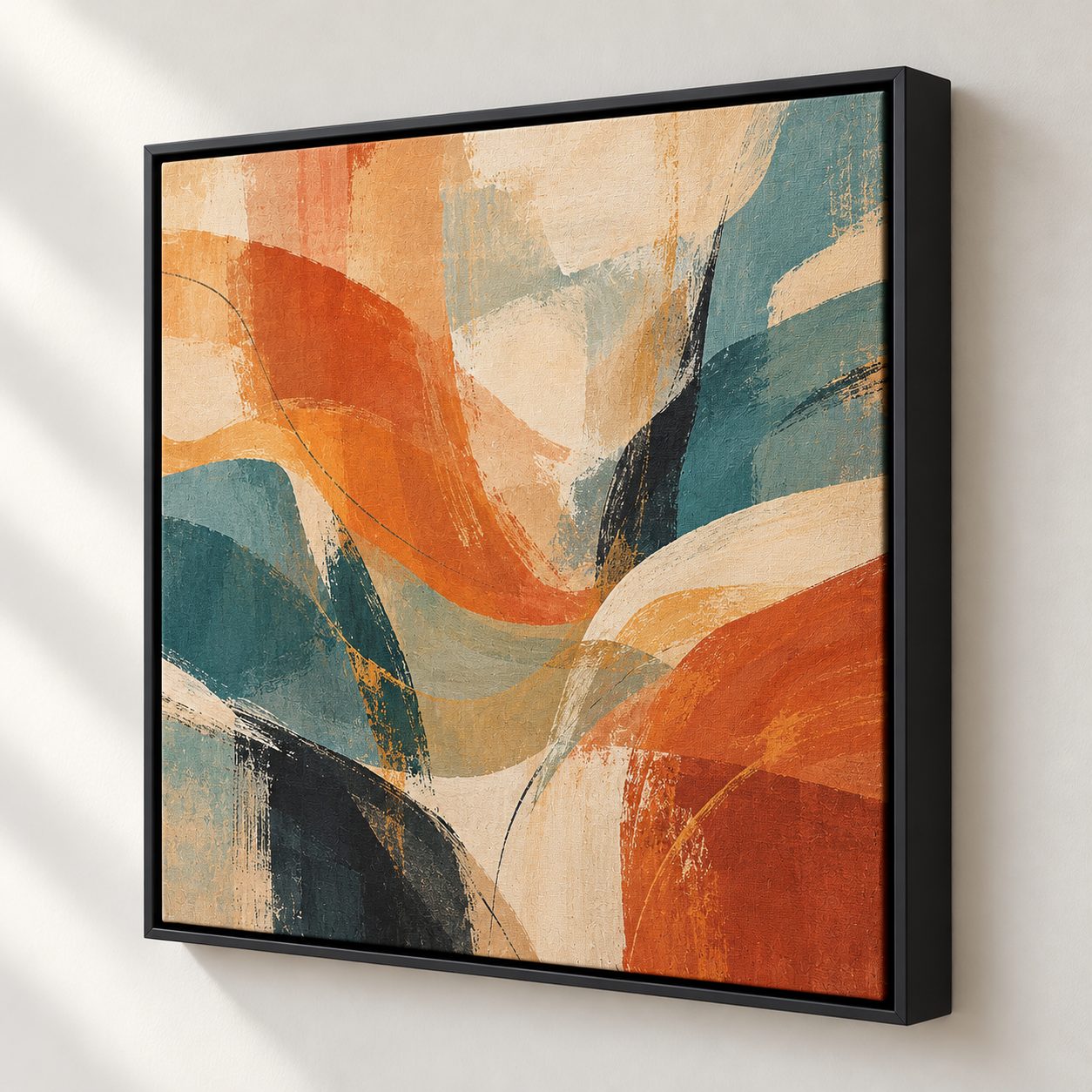 Abstract canvas print in a black floating frame hanging on a wall