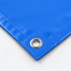 Banner corner with an extra reinforcement patch and a metal grommet