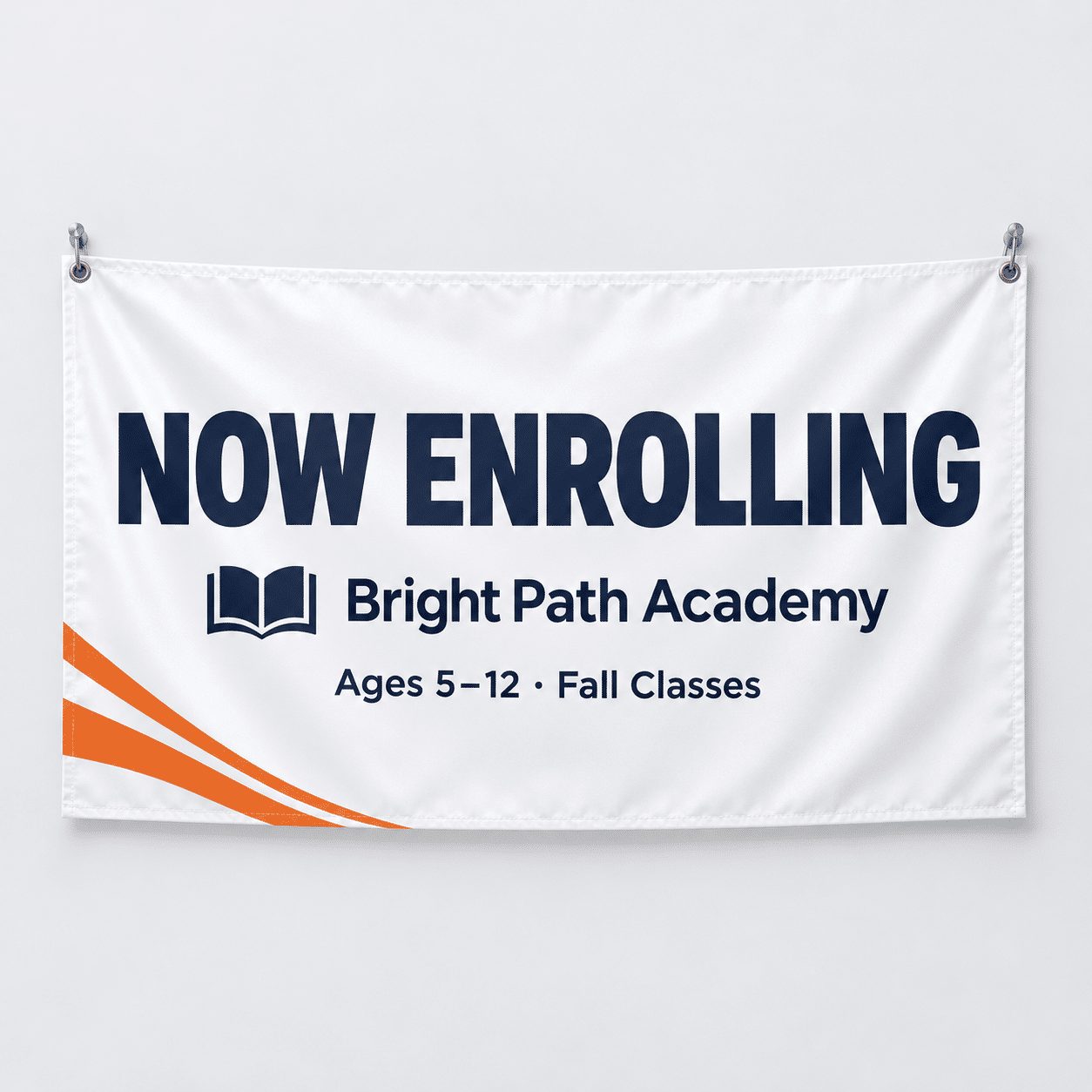 White smooth indoor PVC banner reading Now Enrolling hung on a wall