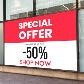 Special Offer 50% off premium vinyl decal applied to a storefront window